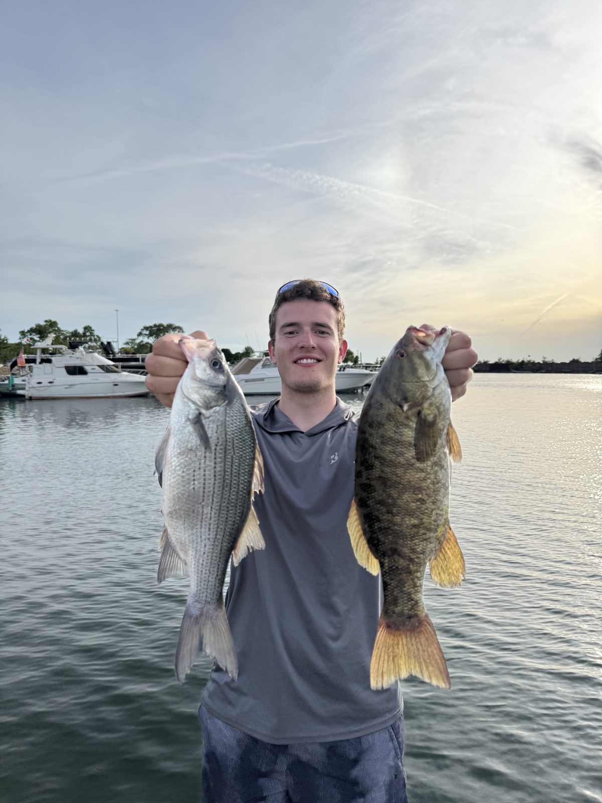 A buddy holding his catch